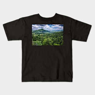 Mountains covered in pine trees Kids T-Shirt